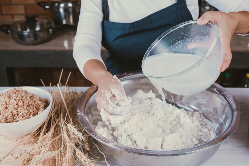 Healthy Indian kitchen with Milan Atta Maker flour mill in use